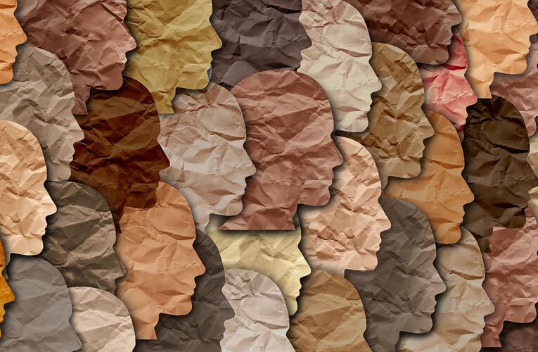 face silhouettes in various skin tones