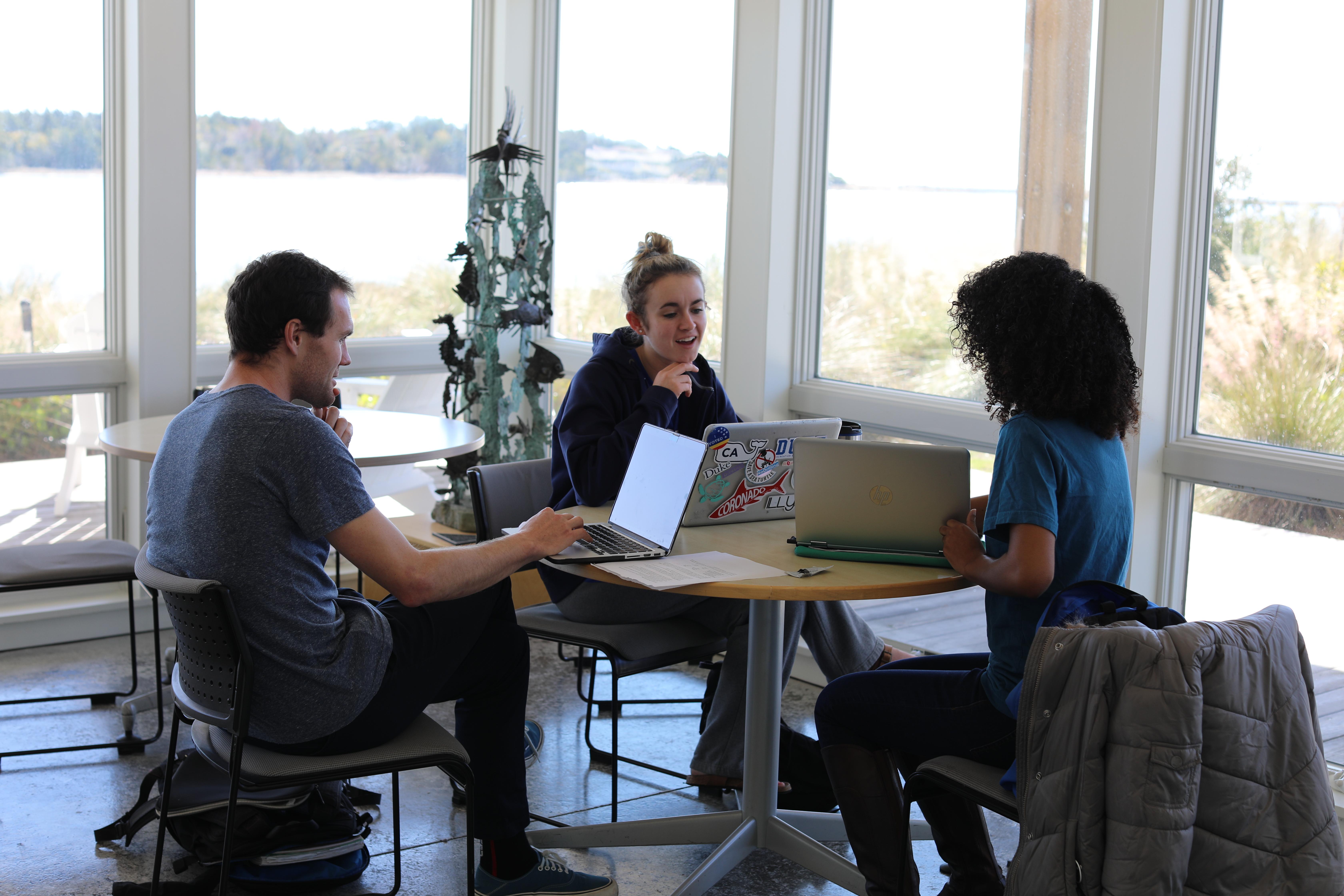 3 students at table