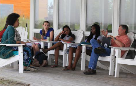 students having class on porch at Marine Lab