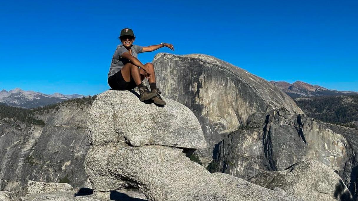 Anya posing on rock formation