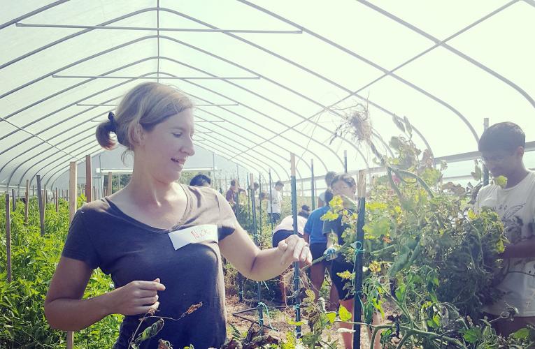Nicki Cagle in greenhouse