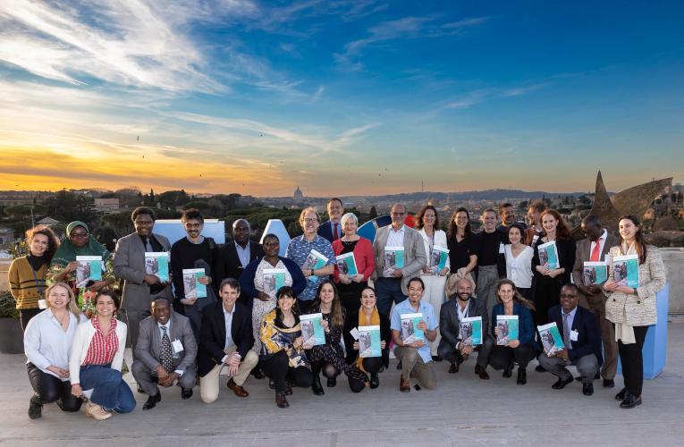 some of the IHH report authors with Rome skyline in background