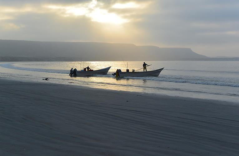 A pair of fishing boats prepares to launch into Mexico’s Gulf of California. 